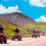 Tourists driving ATVs in Maras and Moray