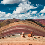 The Ausangate viewpoint on the Palcoyo Rainbow Mountain tour provides sweeping Andean landscapes and distant views of the Vinicunca Rainbow Mountain.